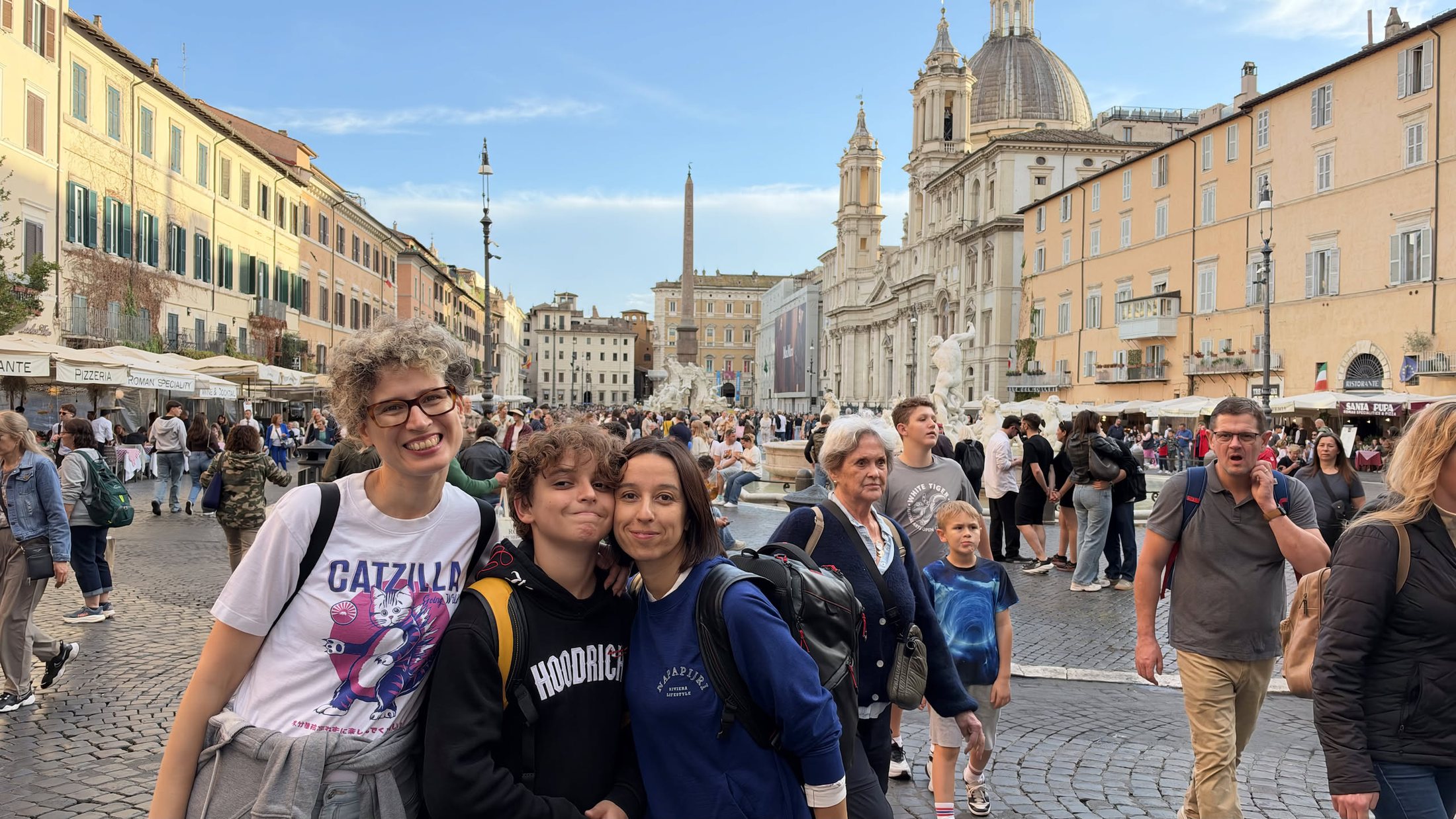 Piazza Navona alle cinque e mezza, con Sant'Agnese in Agone e il cielo che si apre.